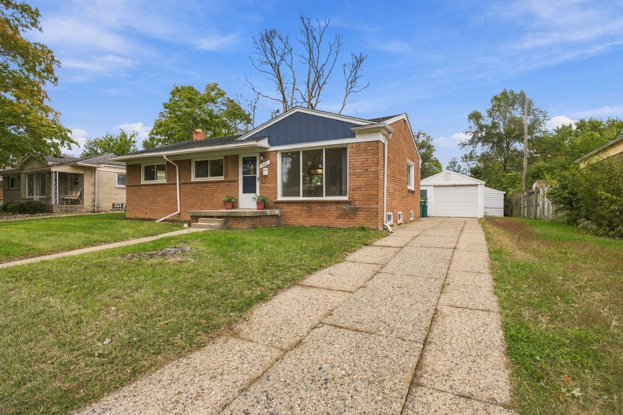 Brick exterior and detached garage at 1063 Lori Street in Ypsilanti Township
